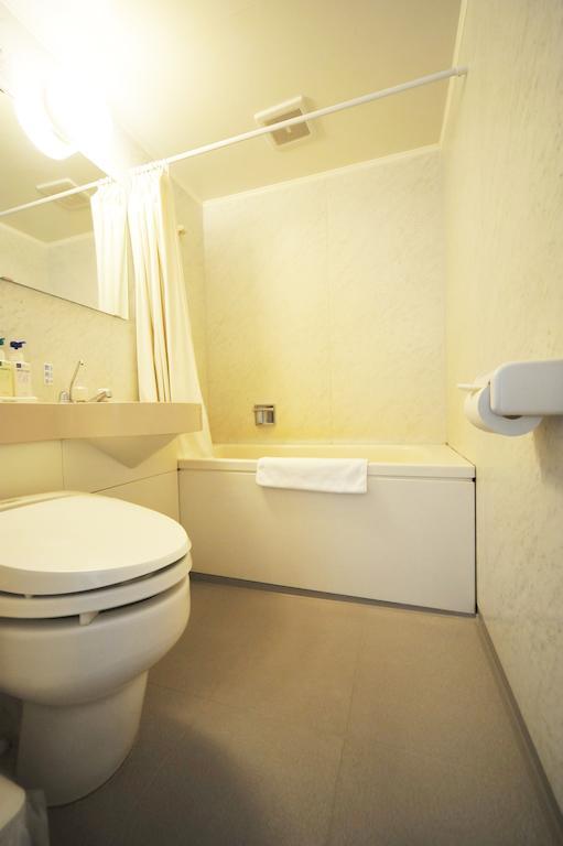 Beppu Station Hotel Habitación foto